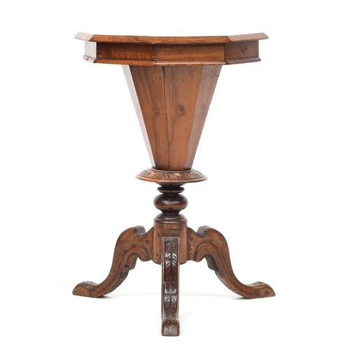 430 - A Victorian octagonal walnut work table, inlaid chessboard top, on carved tripod base, 70cm high