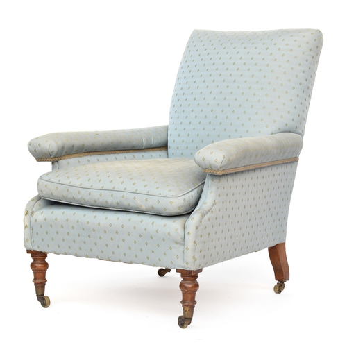 456 - A neat 19th century armchair, with feather filled cushion, on turned front legs with Cope & Collinso... 