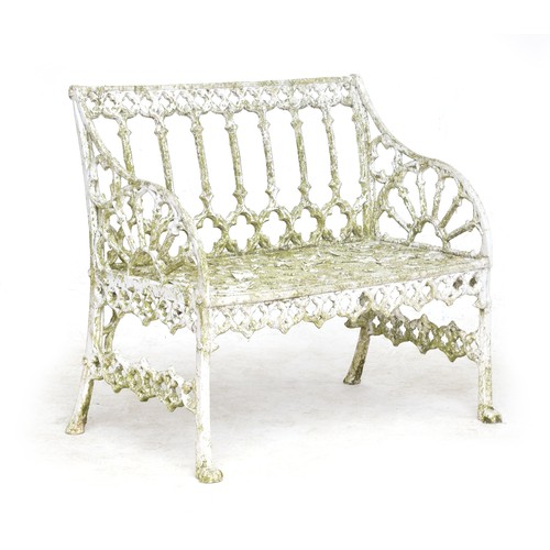 469 - A white painted garden bench with quatrefoil pierced back, 87cmW

Provenance: from the estate of the... 