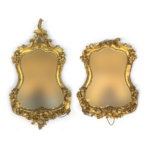 343 - A pair of 18th century gilt gesso rococo girandole mirrors, original shaped plates, the frames with ... 