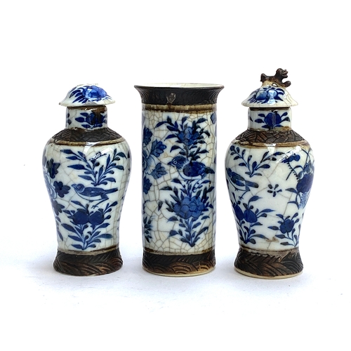 111 - Three Chinese blue and white crackle glaze lidded vases, two covers AF; together with a small matchi... 