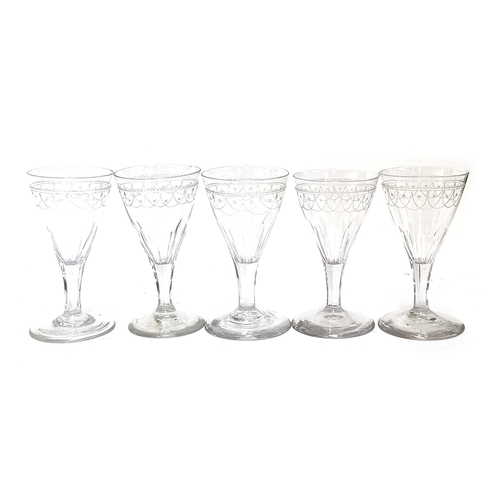 133 - A matched set of five Georgian and later sherry glasses, hand blown, with engraved bowls and faceted... 