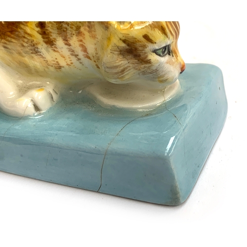 97 - Stella Crofts (1898-1964), Cat Eating, a Royal Worcester figure, model no.2897, glazed in colours, p... 