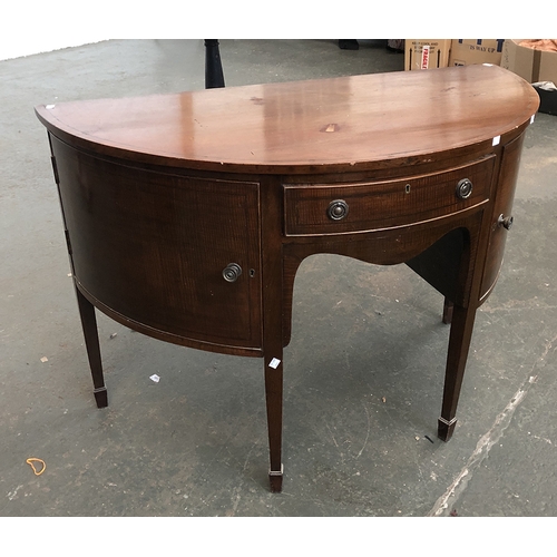 876 - An Edwardian mahogany bowfront sideboard, with single drawer, flanked by two cupboard doors, on squa... 