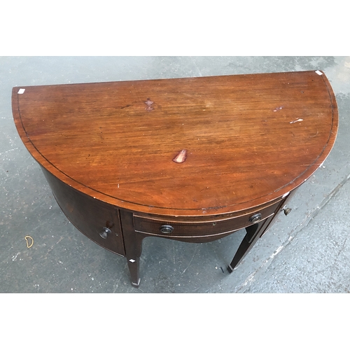 876 - An Edwardian mahogany bowfront sideboard, with single drawer, flanked by two cupboard doors, on squa... 