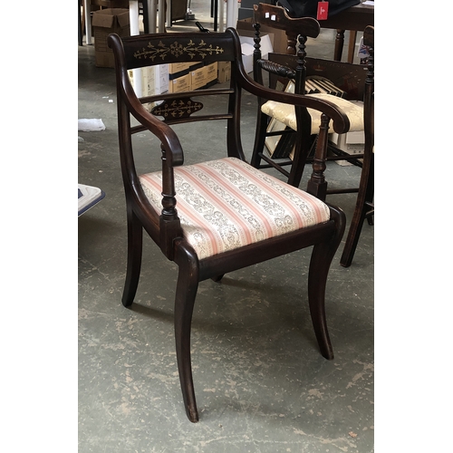 839 - A Regency style brass inlaid open armchair, with drop in seat on swept legs; together with a further... 