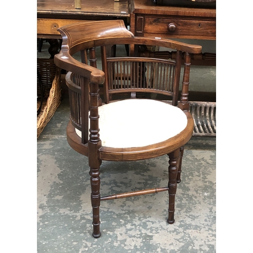 794 - An Edwardian mahogany oval open armchair, together with a leather upholstered Victorian balloon back... 