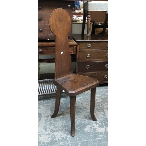 796 - An unusual oak hall chair