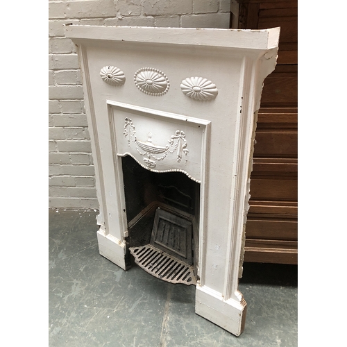 859 - A 19th century cast iron fireplace, decorated with urn and swags, 76cmW, 107cmH