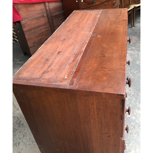 809 - A Victorian mahogany secretaire chest, the fitted drawer over three further graduating drawers on bu... 