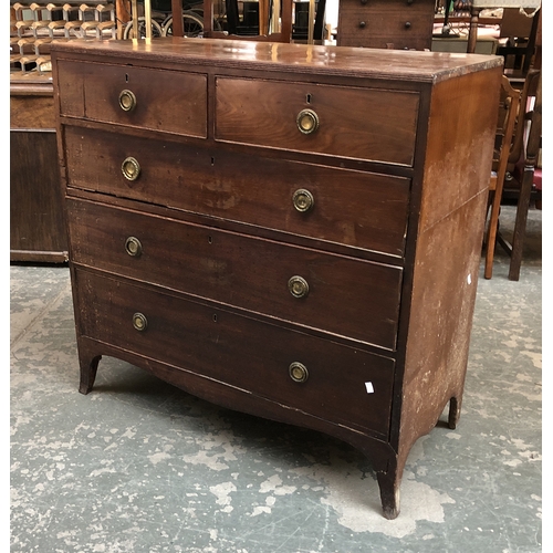 822 - A Regency mahogany chest of two short over three graduating drawers on swept bracket feet, 106x50x10... 