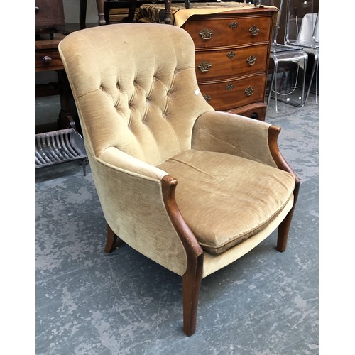 799 - A 20th century teak and button upholstered armchair, 66cmW