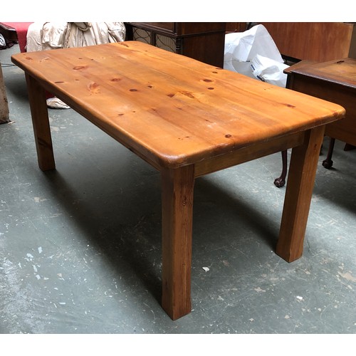 875 - A large farmhouse style pine table, 183x92x79cmH