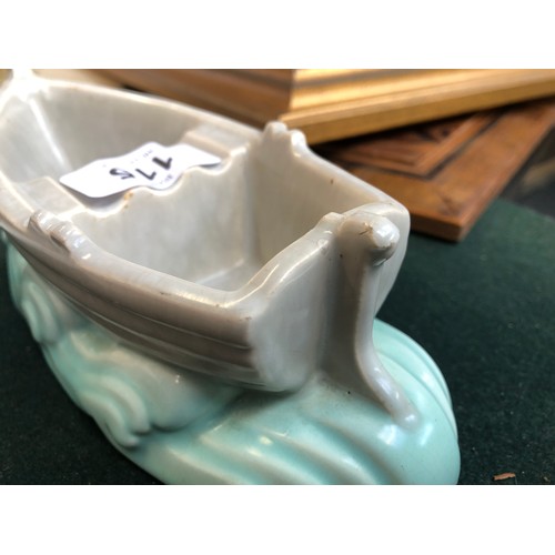 115 - Three Poole Pottery dinghies, each stamped C50 to base, 17cmL