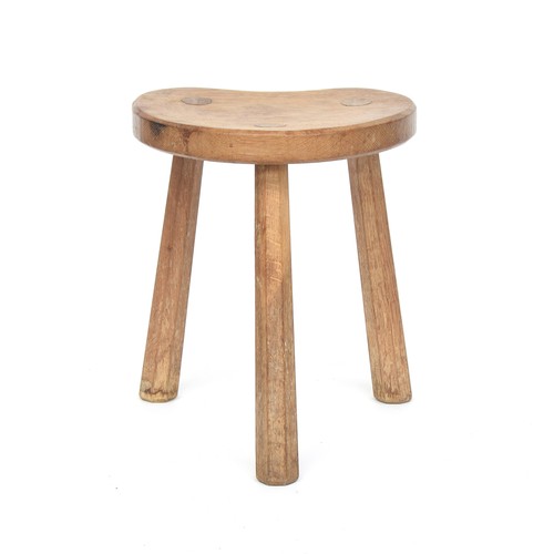 448 - Peter 'Rabbitman' Heap (ex-Mouseman), an oak stool, on three splayed octagonal legs, the dished kidn... 