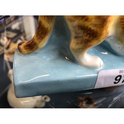 97 - Stella Crofts (1898-1964), Cat Eating, a Royal Worcester figure, model no.2897, glazed in colours, p... 