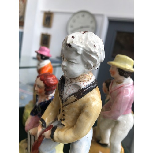 89 - Cricket interest: five 19th century Staffordshire figure groups of cricketers, each approx. 17cmH (o... 