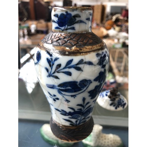 111 - Three Chinese blue and white crackle glaze lidded vases, two covers AF; together with a small matchi... 