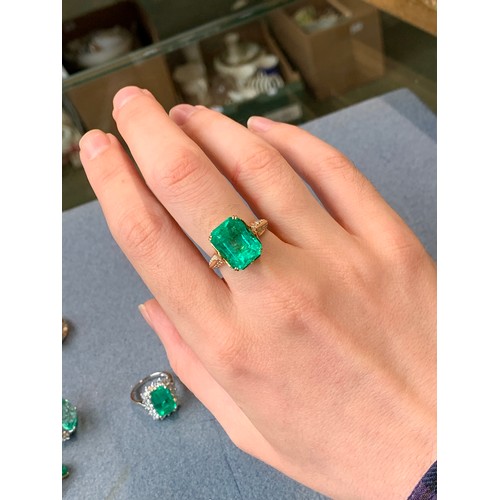 123 - A Kat Florence 18ct gold, emerald and diamond ring, the Muzo Colombian emerald 9.69cts and measuring... 