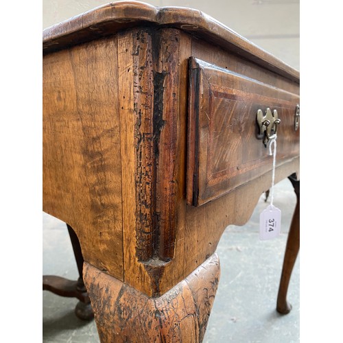 374 - A George II walnut and cross-banded lowboy, the quarter veneered top over single drawer, on cabriole... 