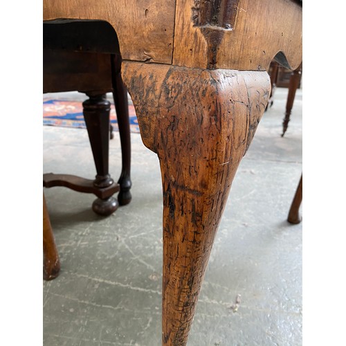 374 - A George II walnut and cross-banded lowboy, the quarter veneered top over single drawer, on cabriole... 