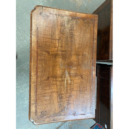 374 - A George II walnut and cross-banded lowboy, the quarter veneered top over single drawer, on cabriole... 