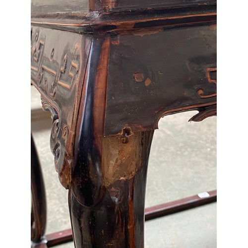 461 - A Chinese stained wood table, the top 97cm square, 87cm high