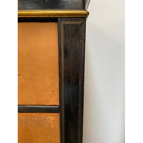 453 - A French ebonised and gilt metal mounted cartonnier, 19th century, 55cm wide, 35cm deep, 165cm high