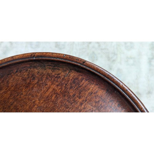 392 - A George III mahogany wine table, the circular dished top raised on a baluster turned column, and tr... 