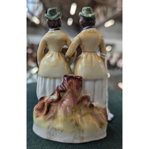 238 - A mid 19th century Staffordshire figure of 'The Alphington Ponies' (Annie and Eliza Durnford), 11.5c... 