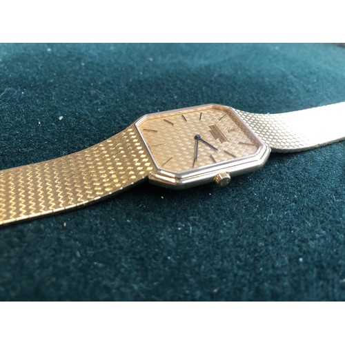 156 - A Patek Philippe 18ct gold gent's bracelet watch, 15J manual wind movement, hallmarked back and brac... 