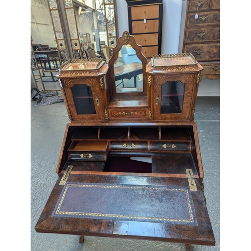 406 - A late 19th/early 20th century burr walnut and marquetry bureau de dame, the superstructure with two... 