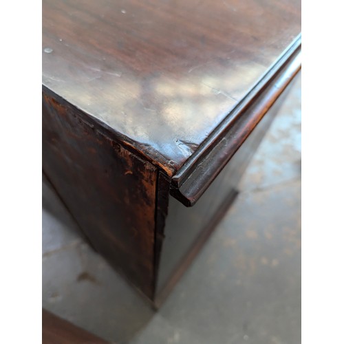 379 - A neat George III mahogany bachelor's chest, with brushing slide over four graduating drawers, on br... 