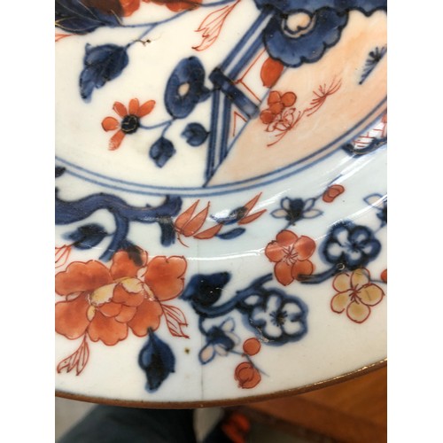 256 - Three 19th century Chinese export dishes, 23cm diameter; together with a similar bowl, 20cm diameter... 