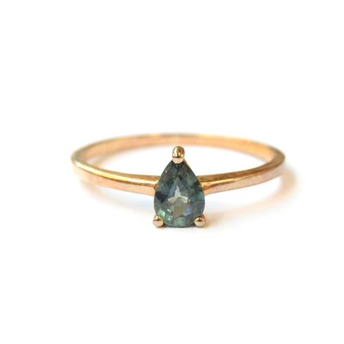 10 - A 9ct gold ring set with a Nigerian sapphire, the pear shaped sapphire 0.8cts, size S, 1.7g