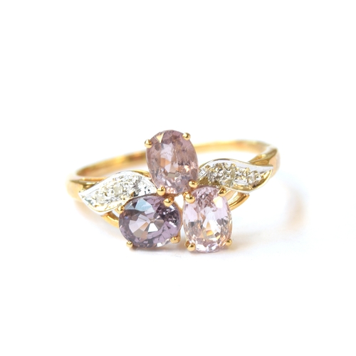 18 - A 10ct gold ring set with Burmese spinels and diamonds, the pink Burmese spinels totalling 2.25cts, ... 