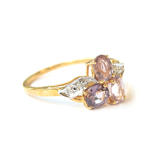 18 - A 10ct gold ring set with Burmese spinels and diamonds, the pink Burmese spinels totalling 2.25cts, ... 