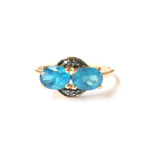 19 - A 9ct gold Neon Apatite and blue diamond ring, the Madagascan Apatites totalling 1.8cts, size Q, 2.1... 