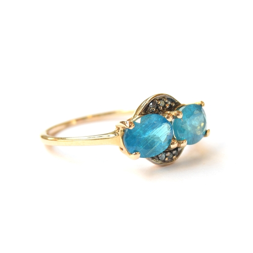 19 - A 9ct gold Neon Apatite and blue diamond ring, the Madagascan Apatites totalling 1.8cts, size Q, 2.1... 