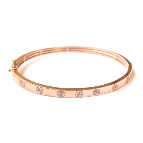 2 - A rose gold vermeil sterling silver bangle set with approx. 0.5cts of natural uncut pink diamonds, 1... 