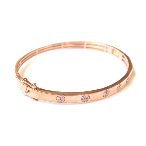 2 - A rose gold vermeil sterling silver bangle set with approx. 0.5cts of natural uncut pink diamonds, 1... 