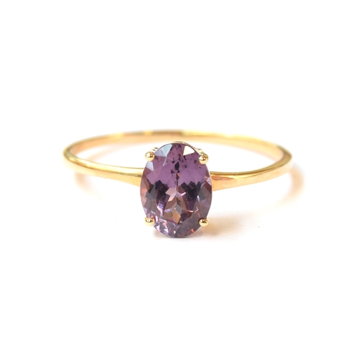 20 - A 14ct gold purple Mahenge spinel solitaire ring, the Tanzanian spinel 1.63cts, size S, 1.6g