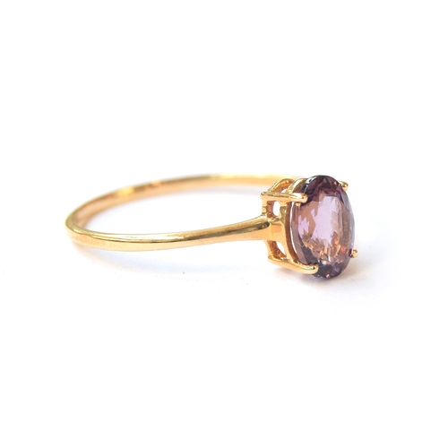 20 - A 14ct gold purple Mahenge spinel solitaire ring, the Tanzanian spinel 1.63cts, size S, 1.6g