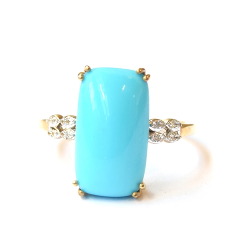 22 - A 9ct gold ring set with a cushion cabochon Sleeping Beauty turquoise, the shoulders set with natura... 