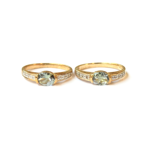 23 - Two 9ct gold rings set with green tanzanite and natural zircons, size N 1/2, the tanzanite each 0.77... 