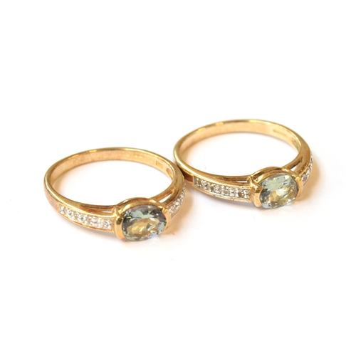 23 - Two 9ct gold rings set with green tanzanite and natural zircons, size N 1/2, the tanzanite each 0.77... 