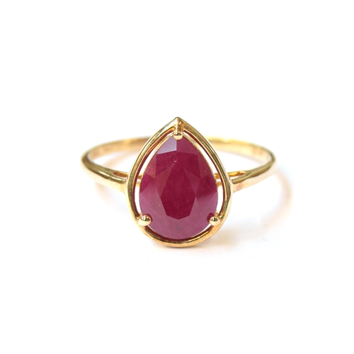 28 - A 9ct gold ring set with a ruby, the pear cut Burmese ruby 3.1cts, size T 1/2, 2.5g