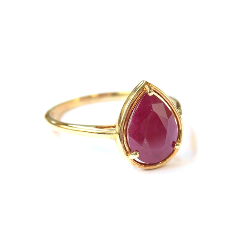 28 - A 9ct gold ring set with a ruby, the pear cut Burmese ruby 3.1cts, size T 1/2, 2.5g