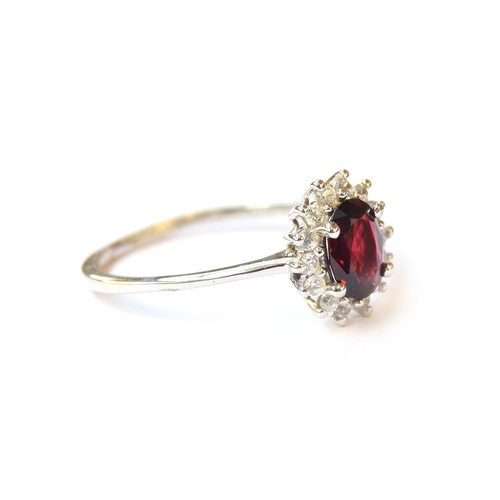 38 - A 9ct white gold Burmese red spinel and natural white zircon ring, the spinel 0.97cts, size R 1/2, 2... 