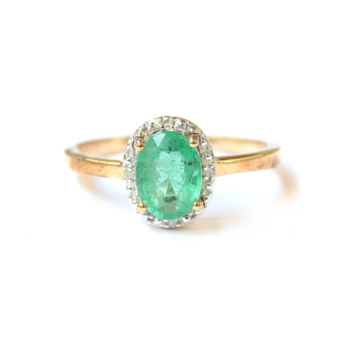 52 - A 9ct gold, emerald and diamond cluster ring, the Zambian emerald 1.1cts and 8x6mm, surrounded by 0.... 